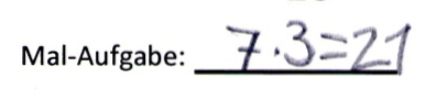 Schülerlösung von Luca: „7 mal 3 = 21“.